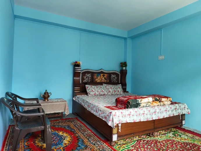 Comfortable bedroom at The Homgarang Abode in Shudarang, Kinnaur