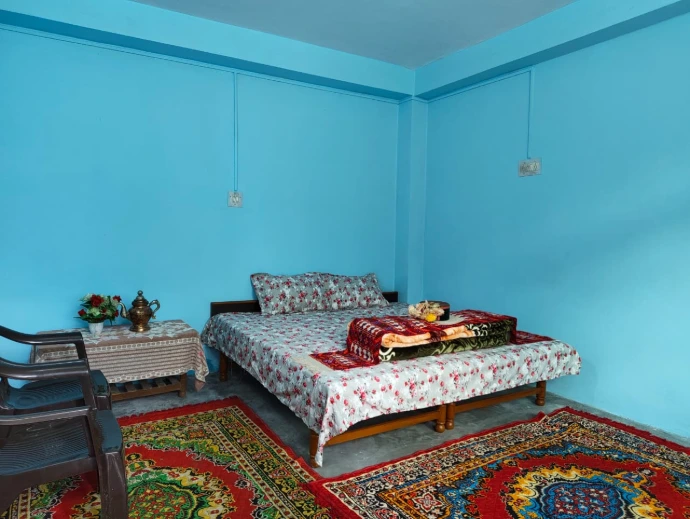 Clean and comfortable guest room at The Homgarang Abode, Kinnaur