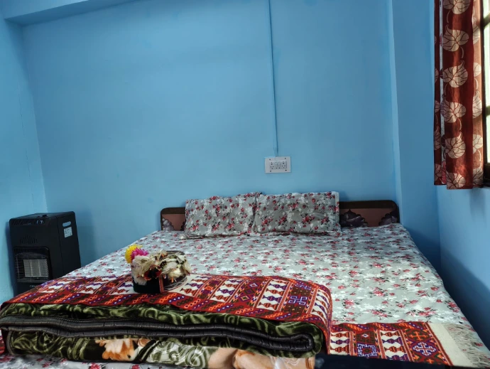 Comfortable kitchen room for guests at The Homgarang Abode in Shudarang