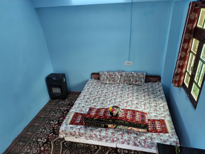 Clean and comfortable room at The Homgarang Abode, Shudarang
